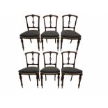 A set of six Victorian walnut dining/bedroom chairs