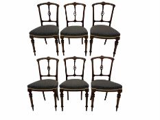 A set of six Victorian walnut dining/bedroom chairs