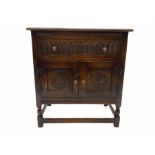 Reproduction carved oak cupboard