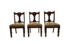 Three Edwardian oak chairs