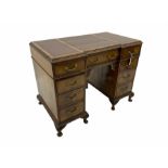 Early 20th century figured mahogany twin pedestal desk