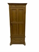 Waxed pine narrow wardrobe/cupboard
