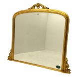 Gilt framed arch top over mantle mirror