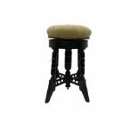 Late Victorian ebonised piano stool