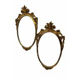 Pair oval gilt wall mirrors