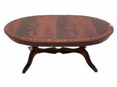 Late 20th century oval mahogany coffee table