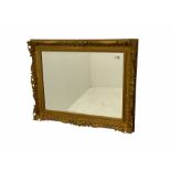 Victorian style rectangular wall mirror in gilt swept frame