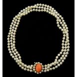 Three strand white/pink cultured pearl necklace