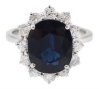 18ct white gold oval sapphire and diamond cluster ring