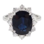 18ct white gold oval sapphire and diamond cluster ring