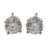 Pair of 18ct white gold single stone round brilliant cut diamond stud earrings