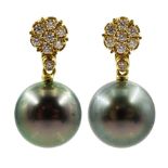Pair of 18ct gold diamond flower head cluster stud earrings