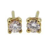 Pair of 18ct gold single stone round brilliant cut diamond stud earrings