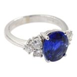 18ct white gold fine oval Ceylon sapphire and six round brilliant cut diamond ring