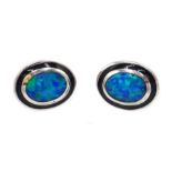 Pair of silver oval opal stud earrings