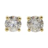 Pair of single stone round brilliant cut diamond stud earrings