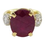 18ct gold three stone oval ruby and round brilliant cut diamond ring