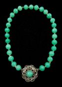 Chinese jade bead necklace with silver open work clasp with a cabochon greenstone/possibly jade bead