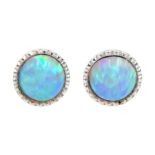 Pair of silver circular opal stud earrings