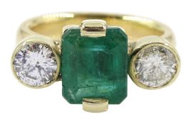 18ct gold three stone emerald and round brilliant cut diamond ring