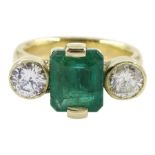18ct gold three stone emerald and round brilliant cut diamond ring