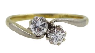 Gold two stone round brilliant cut diamond crossover ring