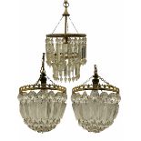 Mid 20th century cut glass centre light fitting and a pair of brass and glass light fittings (3)