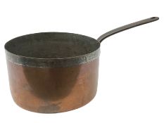 19th century large and heavy seamed copper saucepan with fixed iron handle