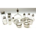 Group of silver mounted glass bottles and open salts