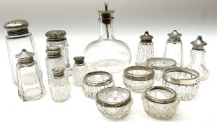 Group of silver mounted glass bottles and open salts