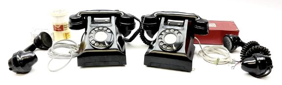 Two vintage black Bakelite telephones