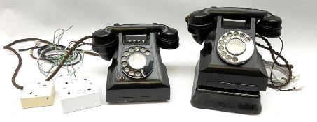 Two vintage black Bakelite telephones