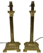 Pair of brassed Corinthian table lamps