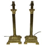 Pair of brassed Corinthian table lamps