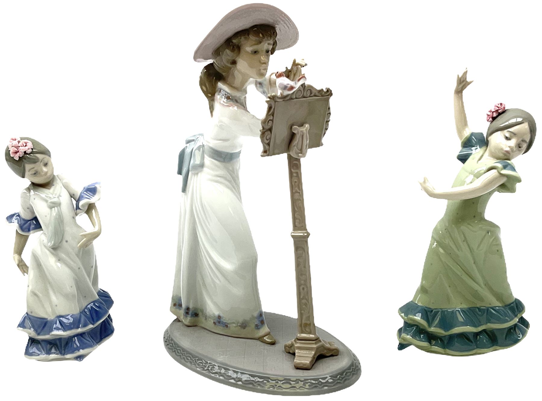 Lladro figure modelled as a female figure playing the flute