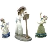 Lladro figure modelled as a female figure playing the flute