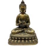 Cast brass figure of a seated Buddha