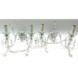Pair of glass wall sconces