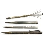 Three silver propelling pencils