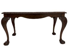 Mid 20th century figured walnut rectangular coffee table