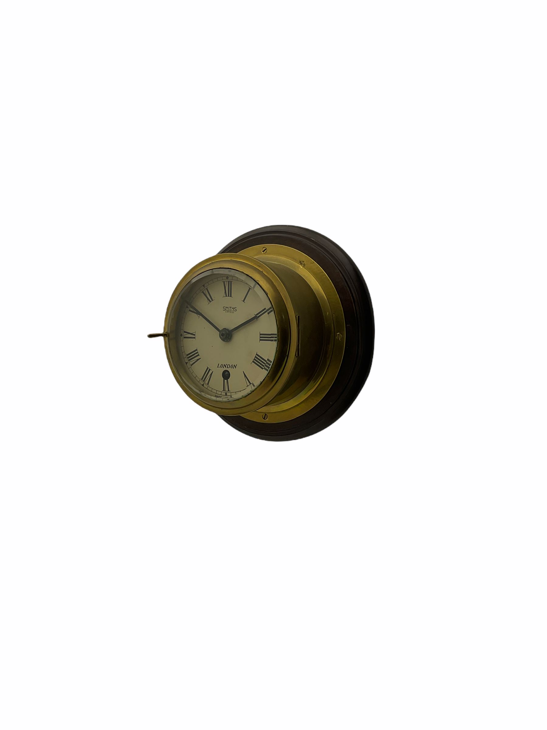 20th century brass cased bulkhead clock mounted on a circular mahogany base - Image 2 of 2