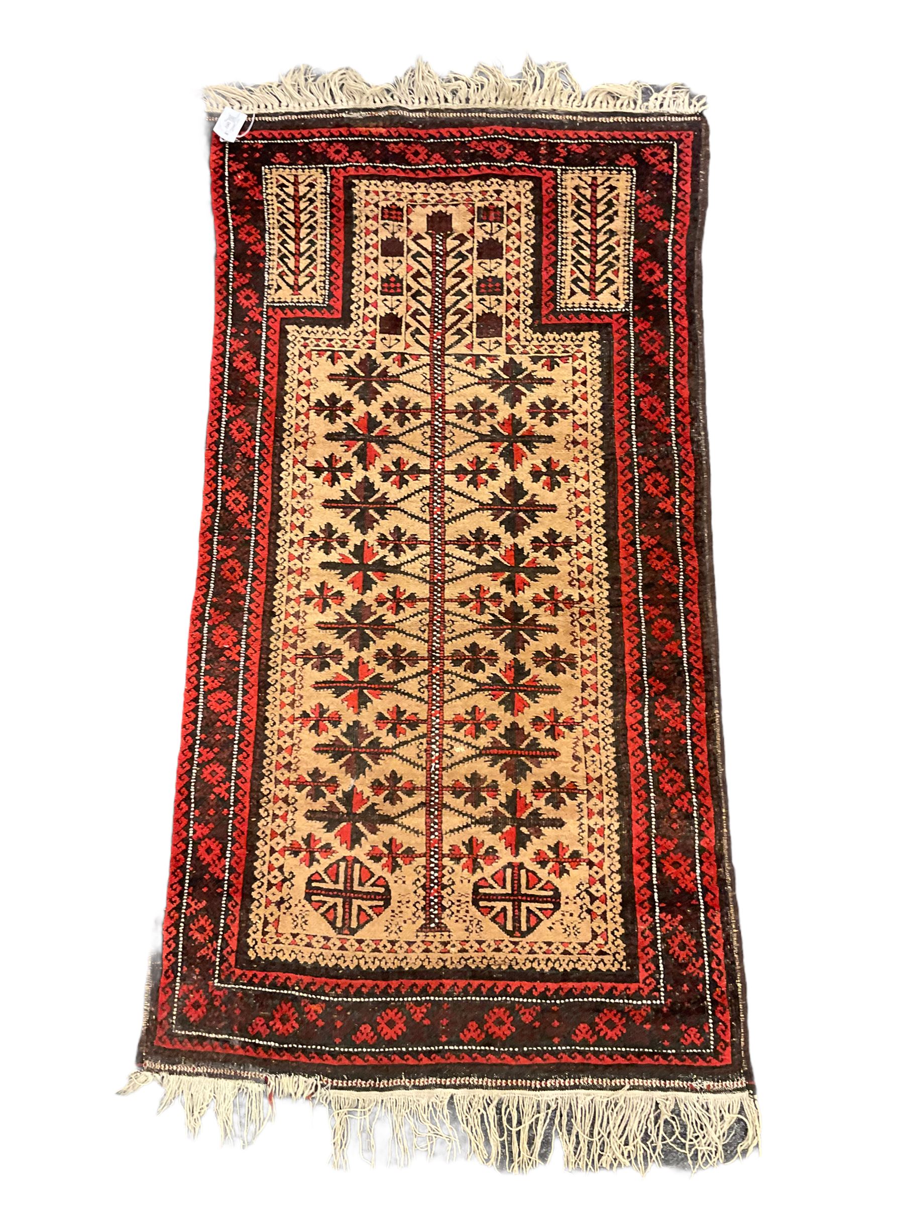 Baluch red and light brown ground prayer rug