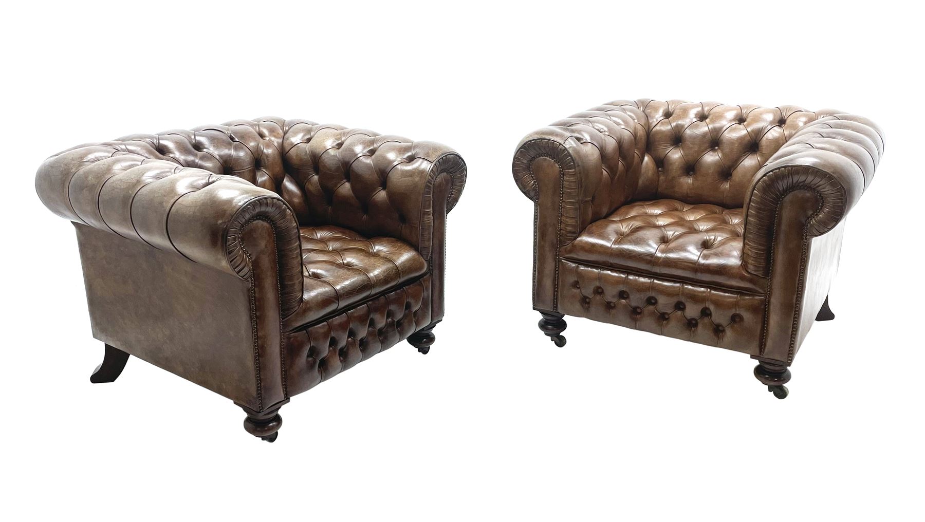 Large pair of Country House chesterfield club armchairs of generous proportions