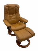 Stressless reclining armchair with matching stool