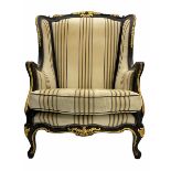 Thomas Messel design classical ebonised and gilded wing back chair