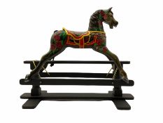 Painted and carved wood rocking horse