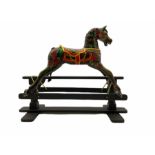 Painted and carved wood rocking horse