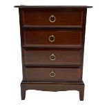 Pair of Stag Minstrel mahogany four drawer chests