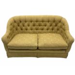 Traditional shaped two seat sofa