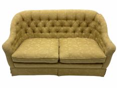 Traditional shaped two seat sofa